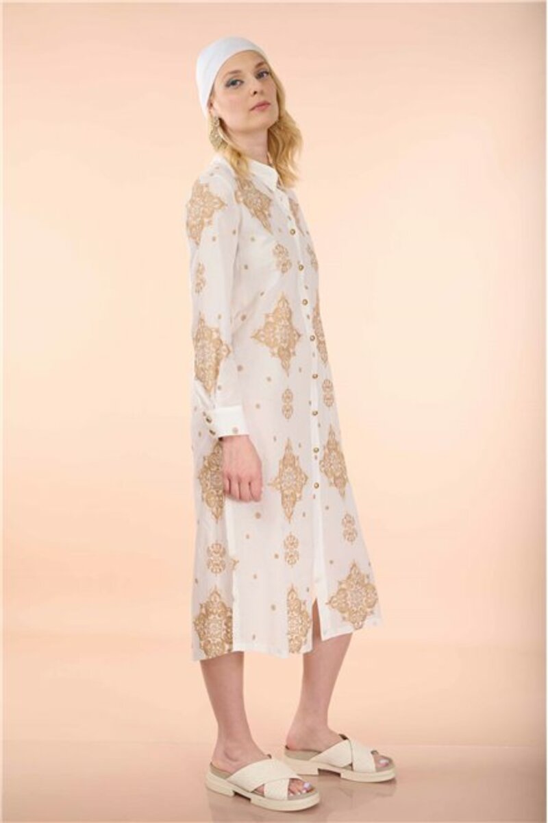 PRINTED SHIRT DRESS WITH COLLAR AND LONG SLEEVES.FRONT FASTENING WITH BUTTONS