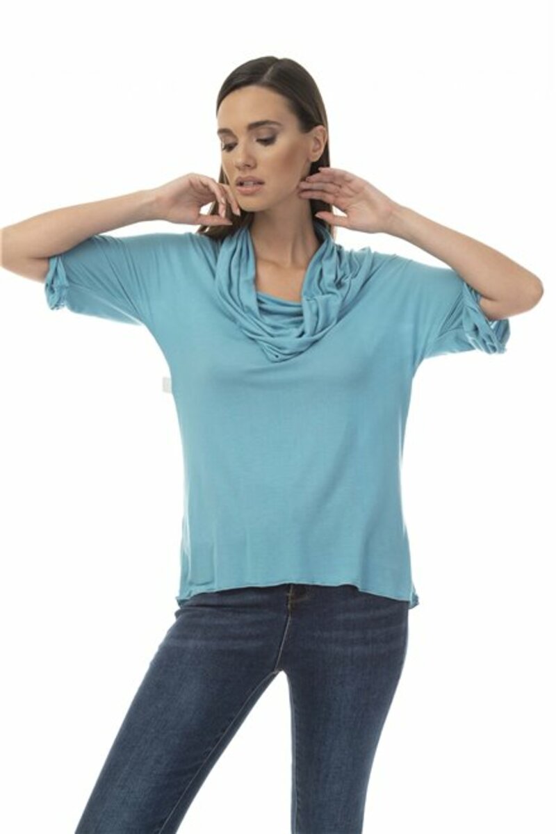 Blouse with fringe on the neckline