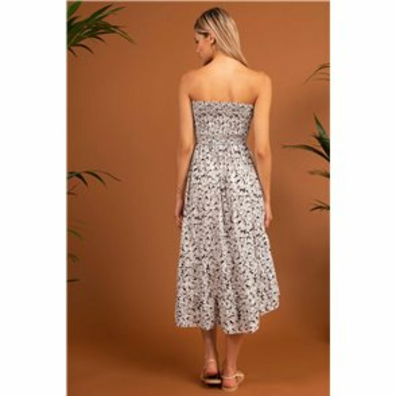 SKIRT-DRESS WITH FLOWER AND SHORT TO THE FRONT WITH FUFFLES