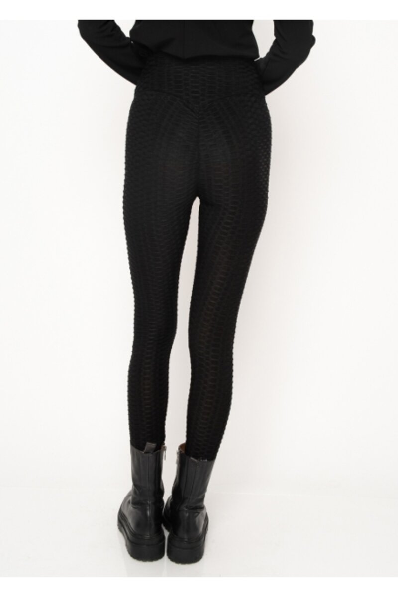 Tights with see-through fabric on the side